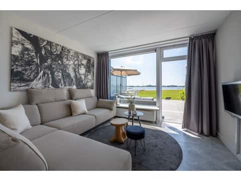 Popular Airbnb listing: Holiday Home by Veerse Meer with Panoramic View in Wijk 03 Kamperland