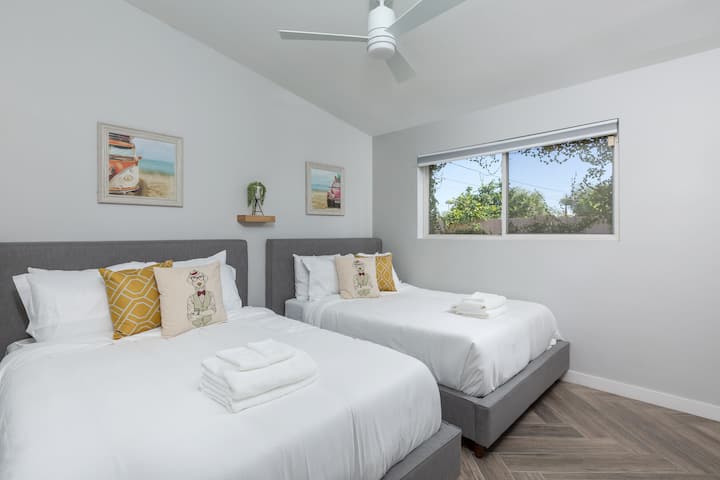 Spacious and comfortable, the 2nd bedroom features two full beds for a restful stay.