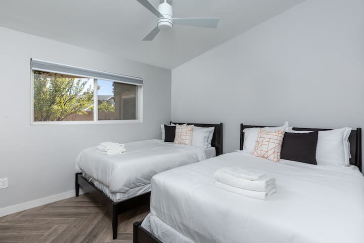 Bright and inviting, the 3rd bedroom features two full beds for ultimate comfort.