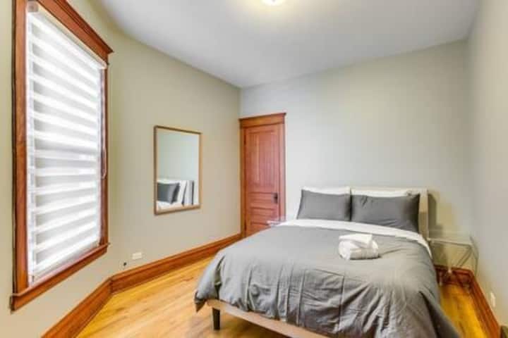 The first of two bedrooms is just off the dining room - it has a closet and a dresser
