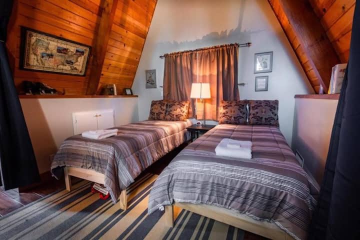 Two twin beds in the loft bedroom