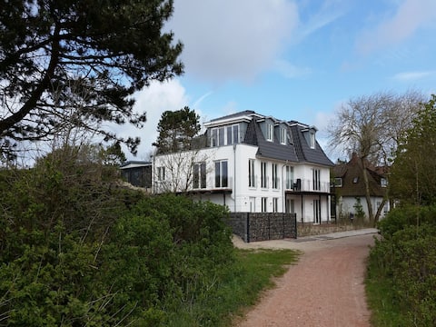 Erfolgreiche Airbnb-Immobilie: Blanker Hans 3, exclusive apartment with balcony in Wangerooge