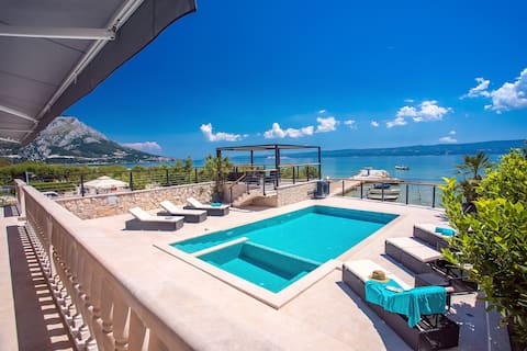 Popular Airbnb listing: Beachfront villa Draga, 32sqm private heated pool in Općina Dugi Rat