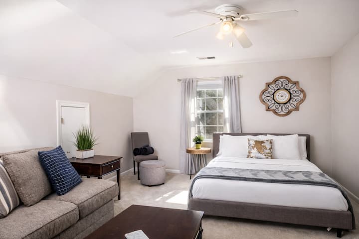 Mini Guest Suite Features Queen Bed and Space to Enjoy Some Downtime with Roku Streaming TV.