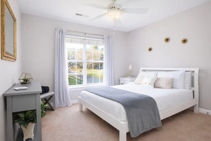 Queen Bedroom is Light and Airy and Overlooks the Front of the House.