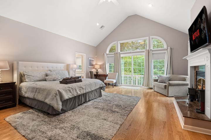 King bed with gas fireplace.  Includes sleeper chair in a half in large primary bedroom with private bathroom.  Desk.