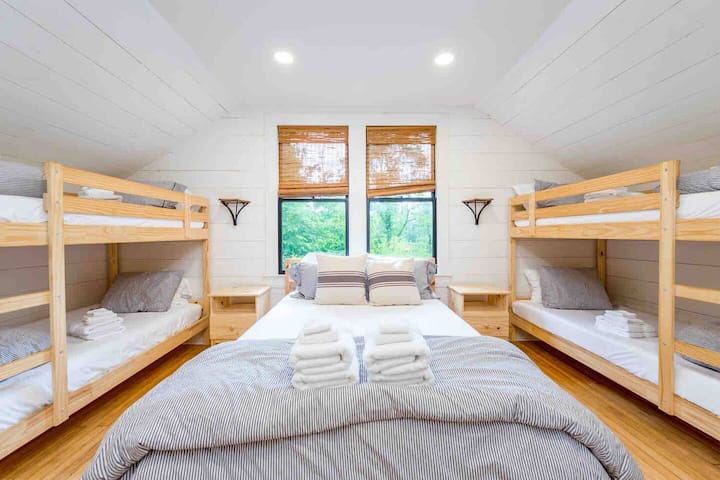 The bunk room!  This room sleeps 7.  A queen, 4 twin bunks and a single twin in the dormer...