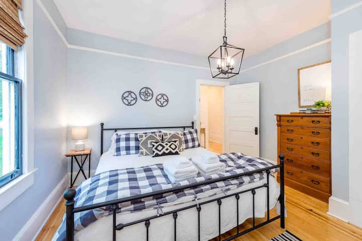 Primary bedroom with a king mattress