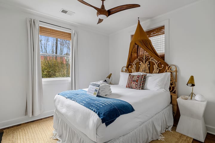Queen bedroom with designer headboard