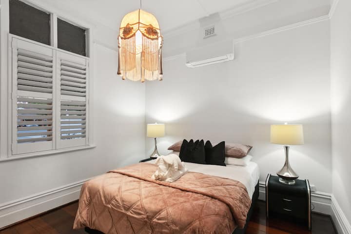 Plantation shutters, and a fringed pendant I found and could not leave