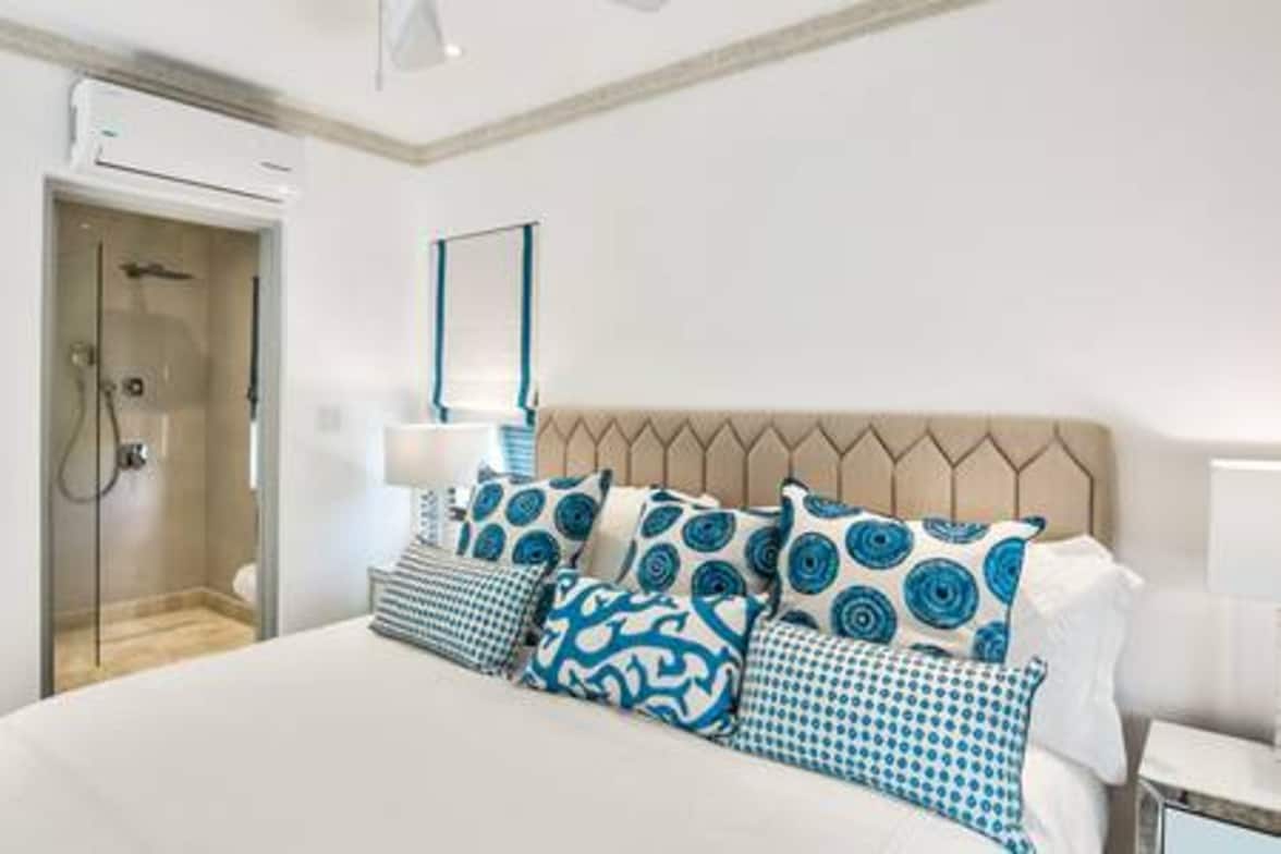 Bedroom 4 with a king size bed (US), ensuite shower room, security safe, air conditioning, bath robes, hair dryer.