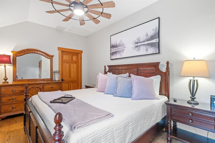 Second floor ensuite bedroom with king bed and its own full bath