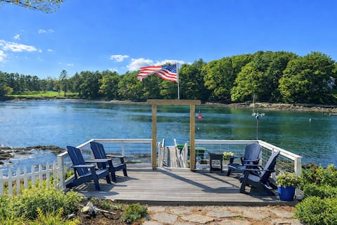 steps to the waters edge deck, and dock.