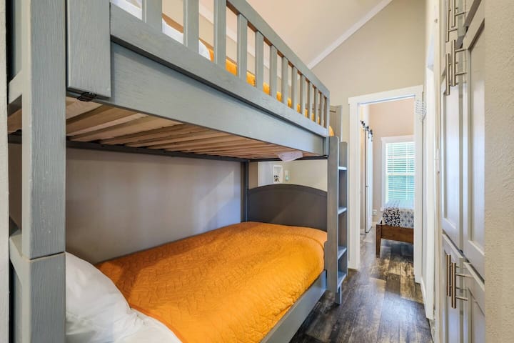 Twin over twin bunks b/t kitchen & bedroom
