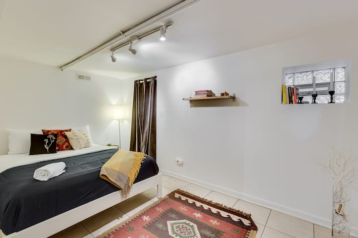 It has a Queen-sized bed and a closet