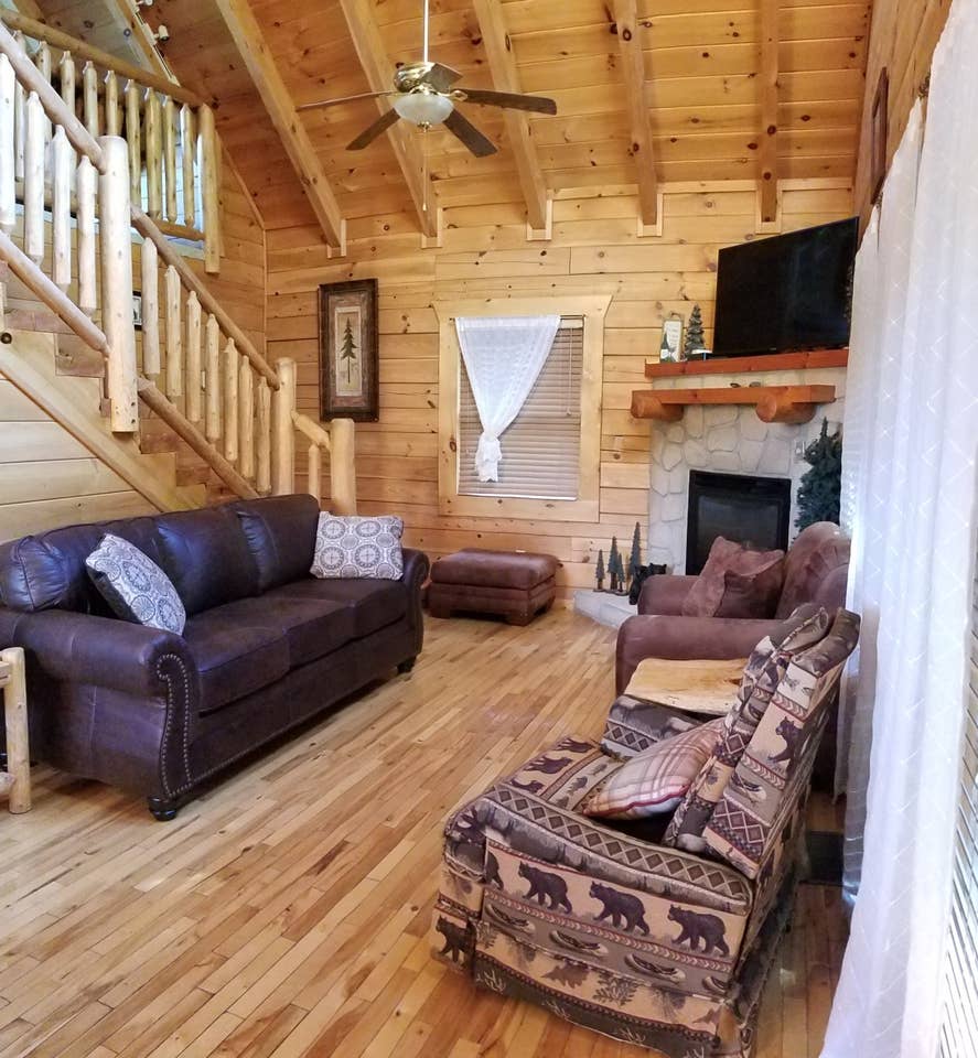 Livingroom with newly upgraded UHD-TV and queen sleeper sofa with memory foam mattress.