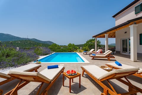 Popular Airbnb listing: Villa Belina: heated pool, game room, gym in Gata