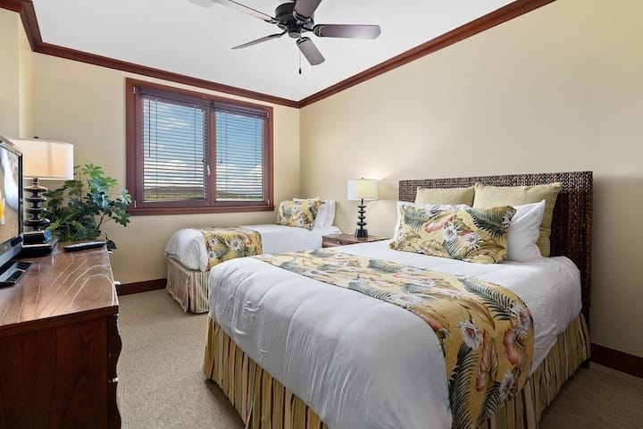 El segundo dormitorio de invitados tiene una cama individual Y una cama tamaño queen.