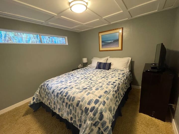 Comfy queen bed with smart tv/dvd player and large closet.