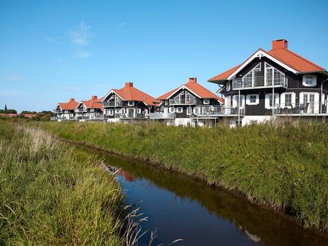 8 person holiday home on a holiday park in bogense