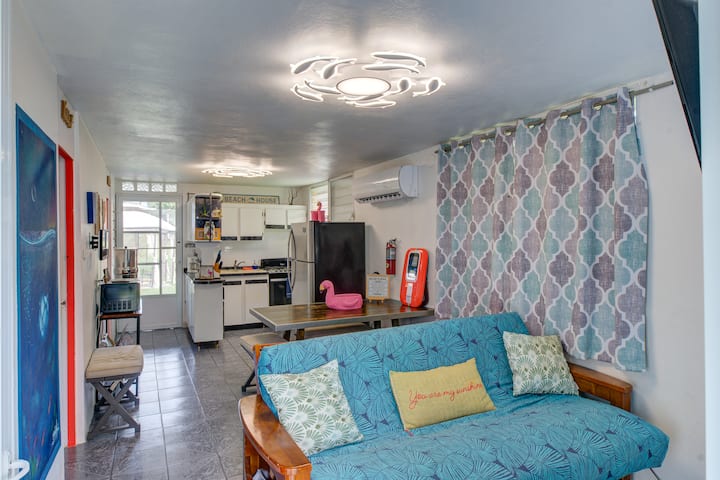 Open living/kitchen area with AC and futon, for 2 extra guests.