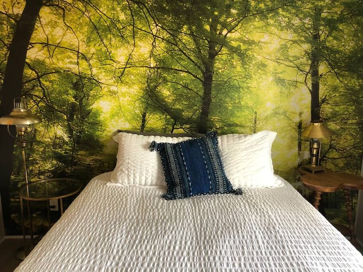 Step into the enchanted forest bedroom , the sheets on the bed are so soft, and the new Zinus mattress will have you dreaming in no time! Also this room has a its own private bathroom.