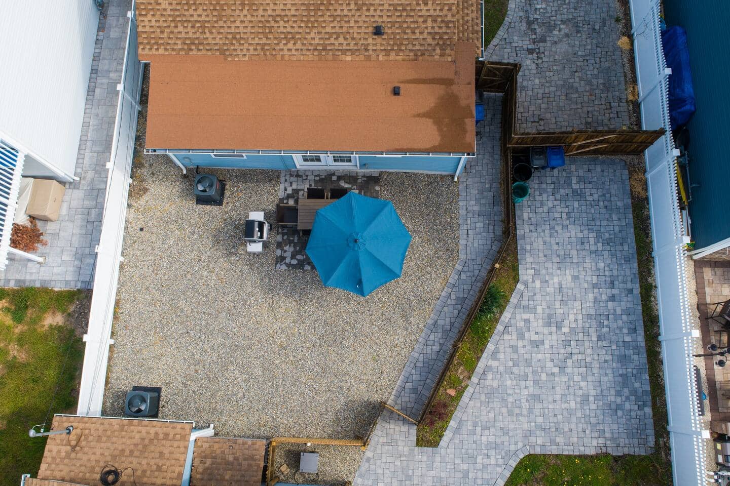Aerial view straight down over the patio and backyard