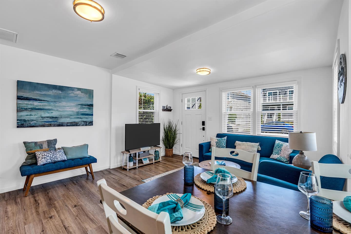 Spacious, beach-inspired lounge with bright natural light at A Shore Thing, Belmar NJ.
