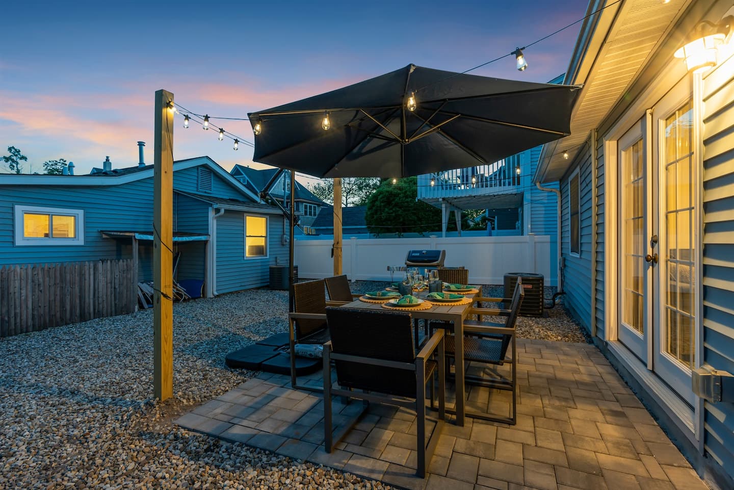 Your private paver patio and grill, on the backyard shared with the cottage next door