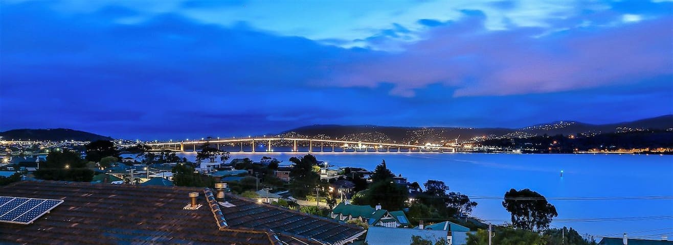 Deep Blue Wow views over river city mountain