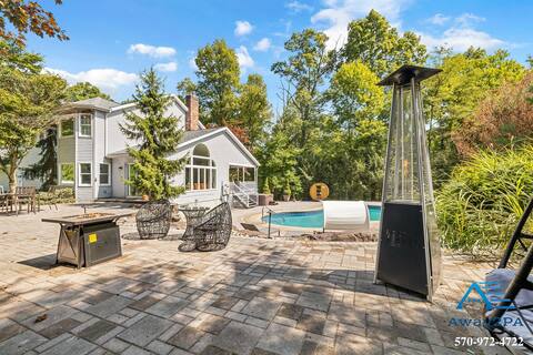 Waterfall Oasis: Spacious Home with Pool & Scenic