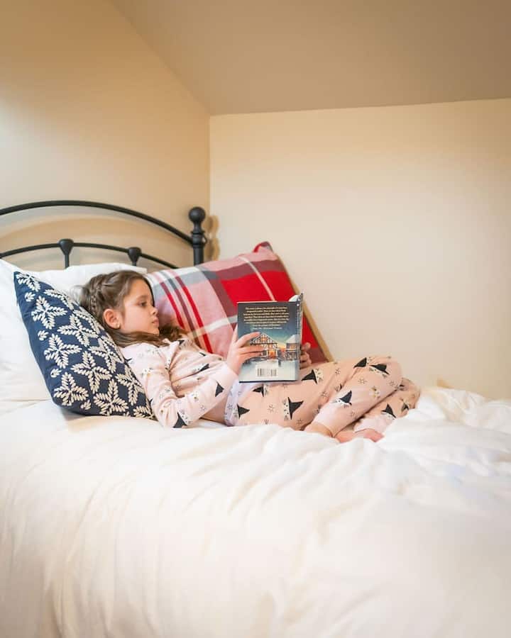 Sweet dreams await in our third guest room. Located on the 2nd floor, this bright space offers two twin beds with plush linens, making everyone feel right at home.