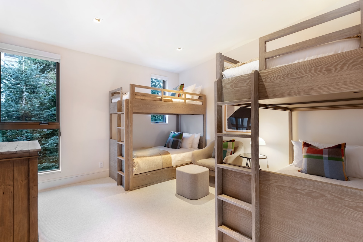 - Bedroom 4 – Bunk room with two sturdy bunk sets and bright window light
- Cozy bedding and modern finishes create a welcoming group-friendly space
- A fun restful retreat perfect for kids, families, and relaxed hangouts
