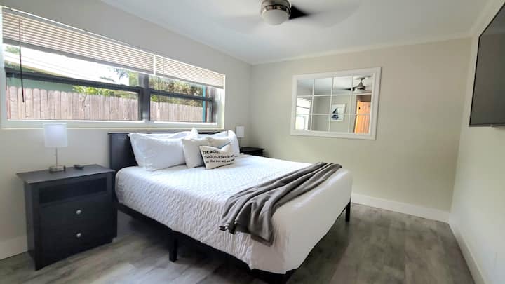 Bedroom #1: Primary suite is spacious, with a cozy king-sized bed.