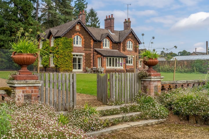 Front of house and enclosed garden