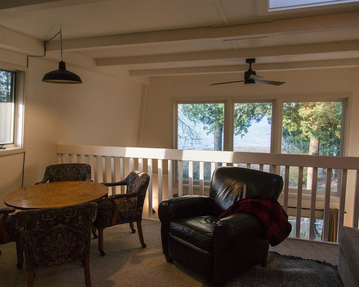 You'll look out from the loft onto the best 2-story view of Clark Lake with expansive windows.