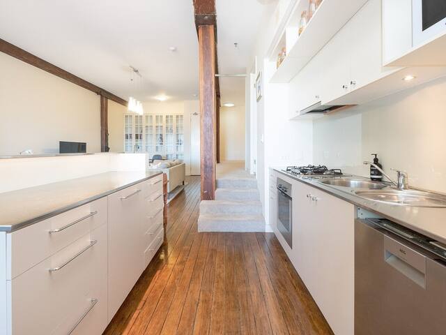 River Views From Classic Woolstore Apartment. gallery image 3