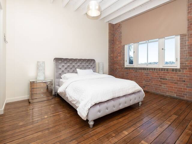 River Views From Classic Woolstore Apartment. gallery image 4