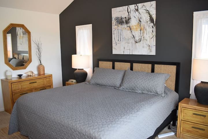 Main king bedroom with private full bathroom