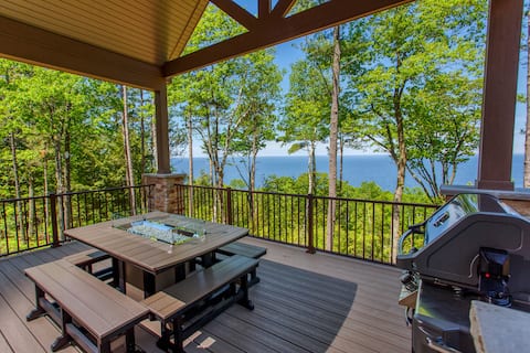 Stunning home with lake views + Golf Simulator!