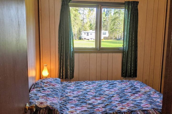 The first of two, well sized bedrooms. This one is to the left after entering the cottage 