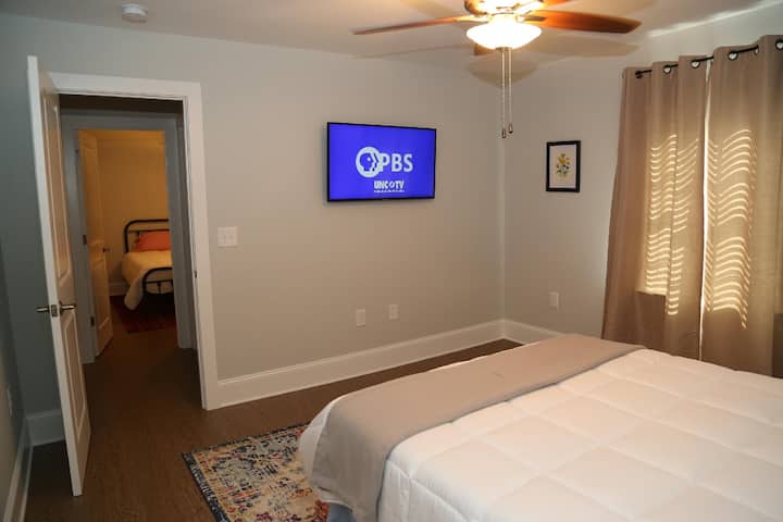 Bedroom 1 - Queen bed & TV