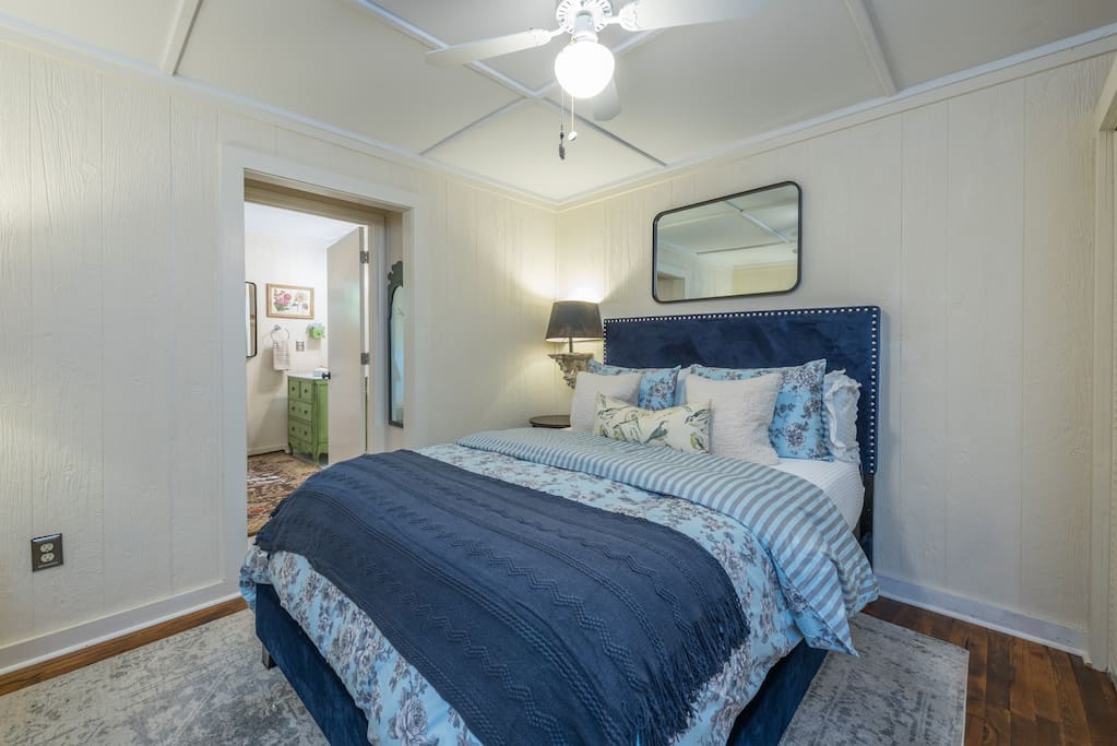 Find peace and comfort in the queen-sized suite, a tranquil space with rustic details and a TV for your convenience.