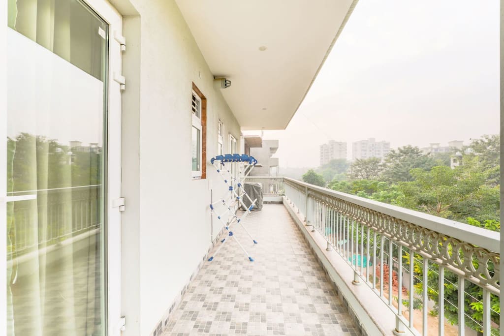 Clean Balcony on Private and have a great views , also have a  washing machine, cloth stand in a corner of the balcony 