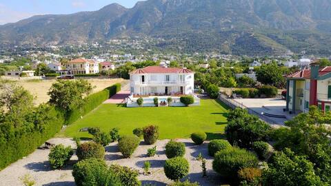 Captivating 5-Bed Villa with private pool & garden