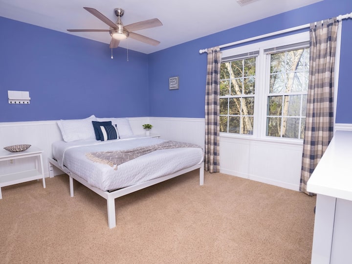 Bright blue walls and sunny views make this a refreshing retreat!