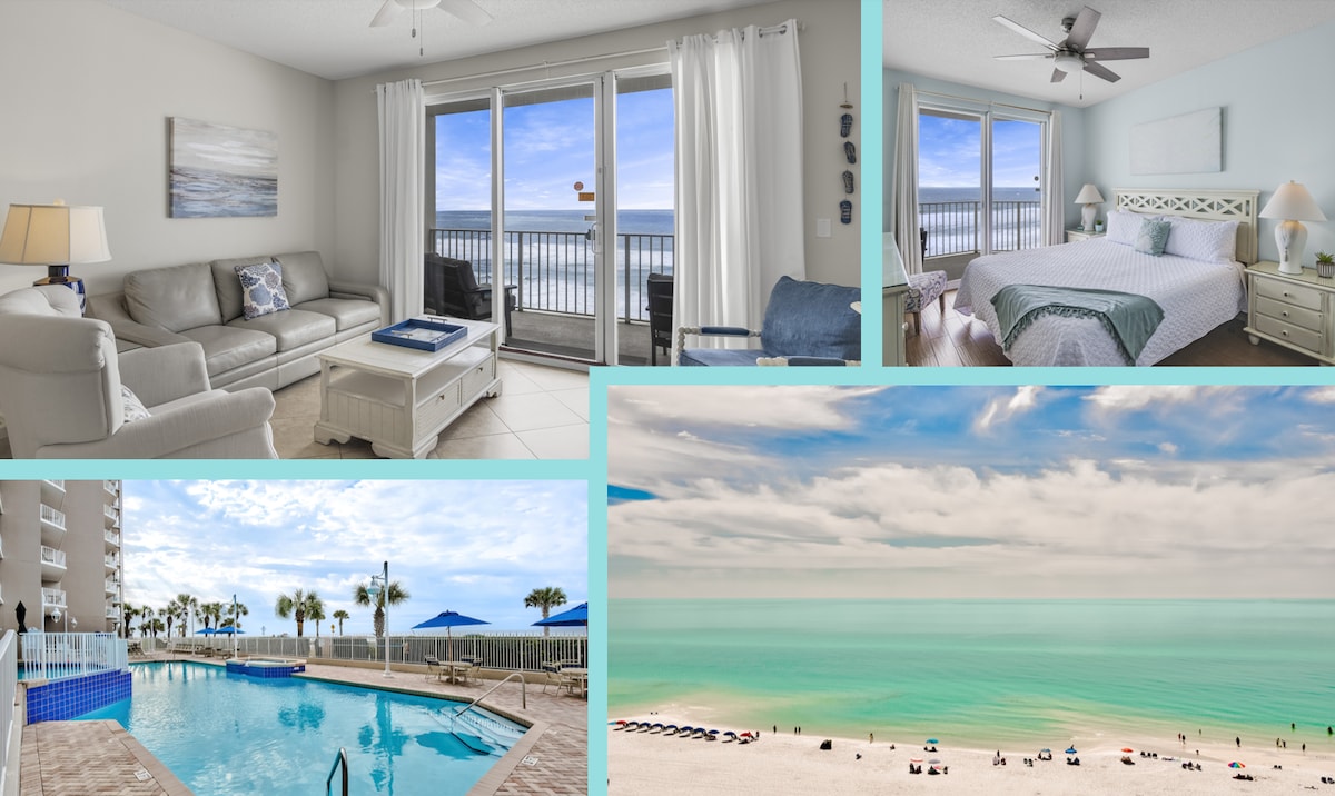 An open living area features a light-colored sofa and a coffee table, with large sliding glass doors offering a view of the Gulf. The bedroom is furnished with a spacious bed and has additional windows showing coastal scenery. A crystal-clear pool invites relaxation with lounge chairs nearby.