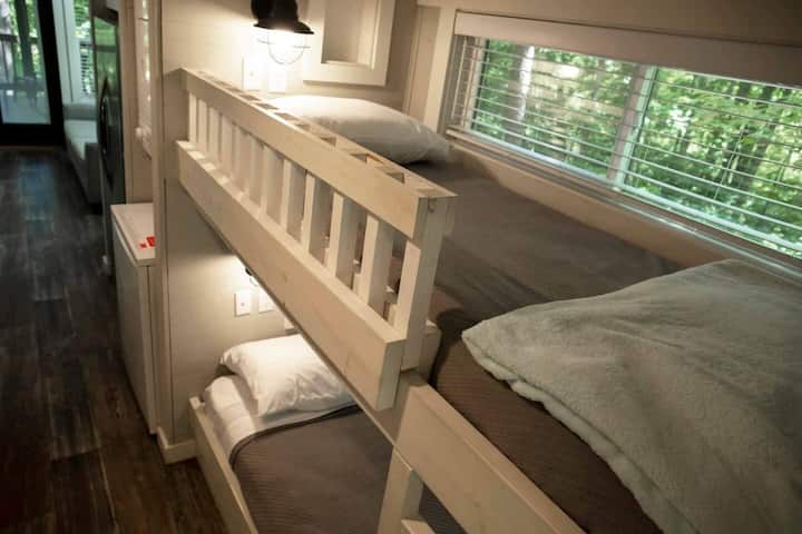 In the hallway, you'll find twin-size bunk beds with a convenient cubby.