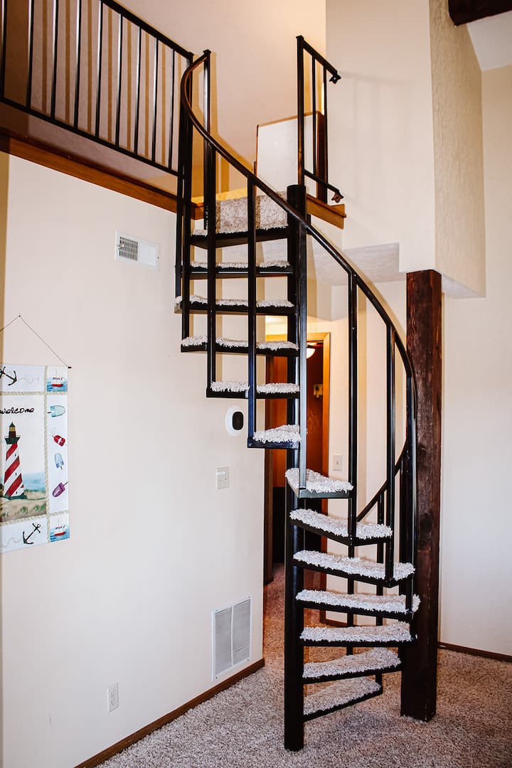 Escaliers menant à la chambre du loft