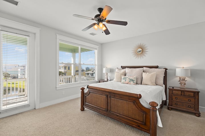 The primary bedroom offers a breathtaking view that will take your breath away